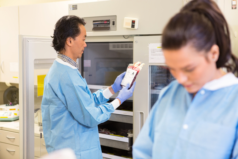 Scientists analysing blood samples